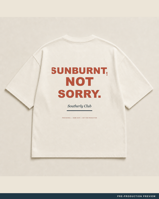 Sunburnt, Not Sorry Tee — main decoration hero — PRE-PRODUCTION PREVIEW [preview-imagery]